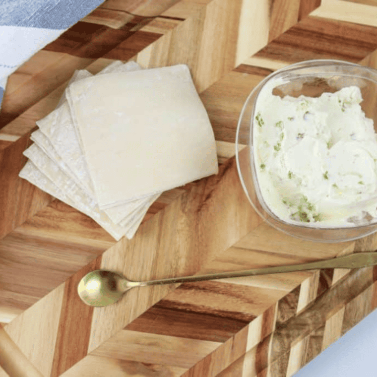 Ingredients Needed For Air Fryer Cream Cheese Rangoons on cutting board.