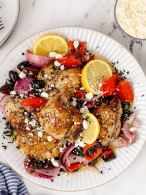 Air Fryer Greek Chicken with summer vegetables is a one-basket Mediterranean dinner—juicy lemon-herb thighs, peppers, onion, and olives in just 25 minutes.