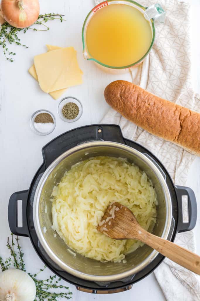 "Sautéing onions in the Instant Pot for Copycat Panera's French Onion Soup."