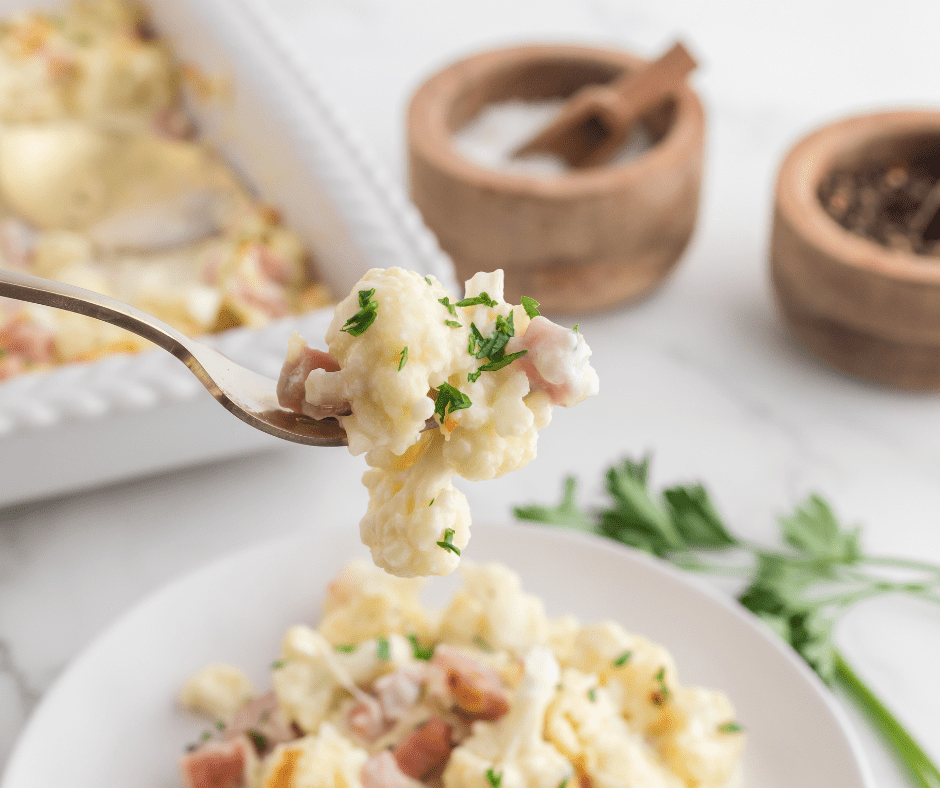 Plate of Air Fryer Cauliflower Gratin with a fork eating.