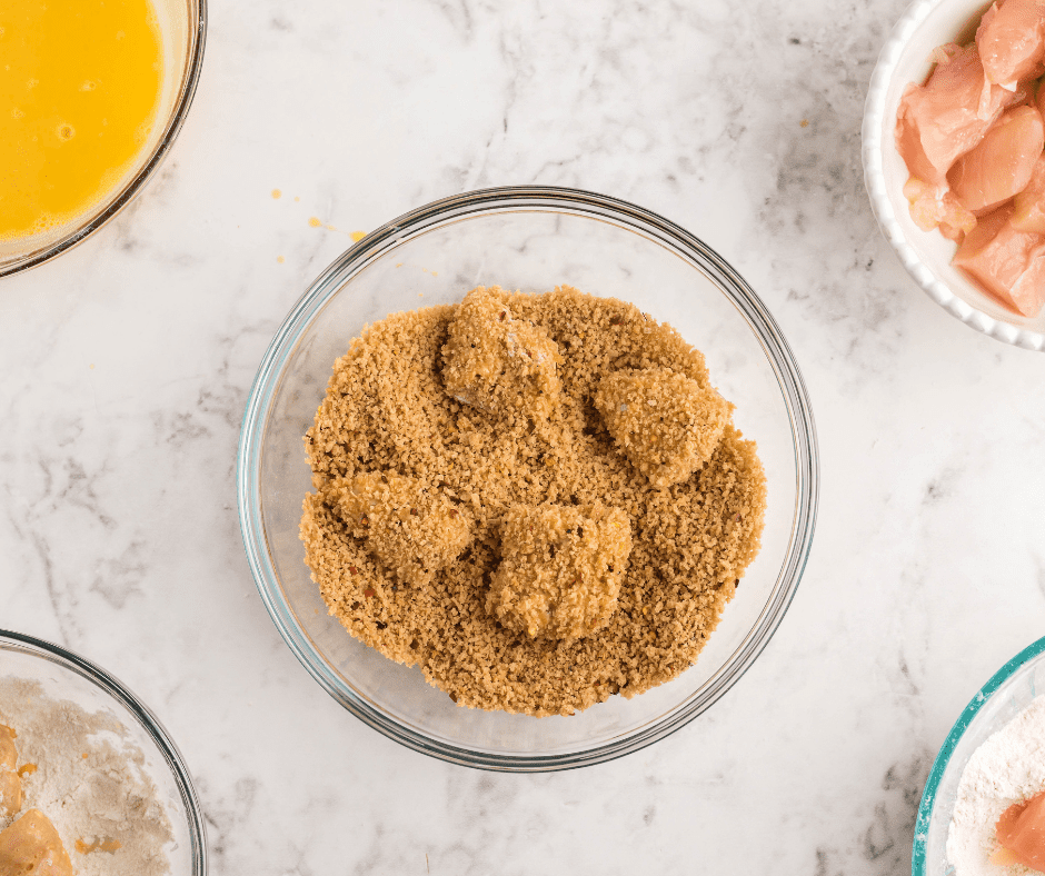 "Marinating chicken pieces in orange sauce for Air Fryer Orange Chicken"