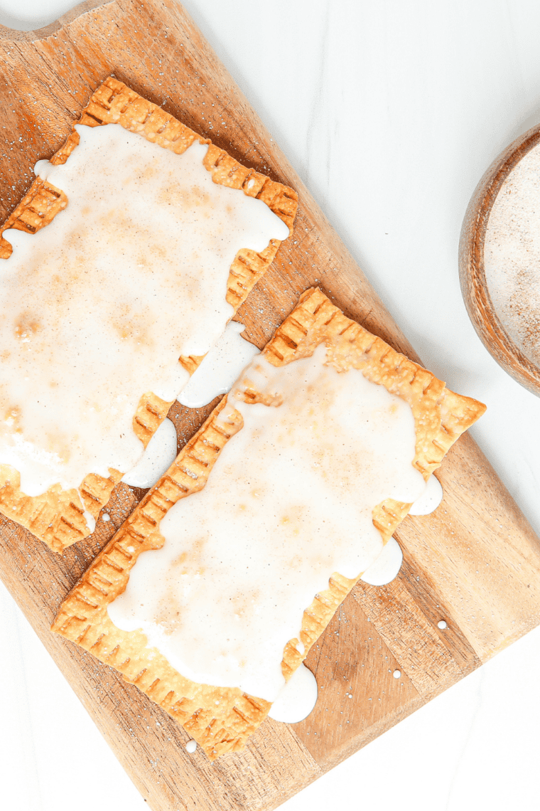 Cut Air Fryer Pumpkin Pie Pop-Tart showing pumpkin filling."