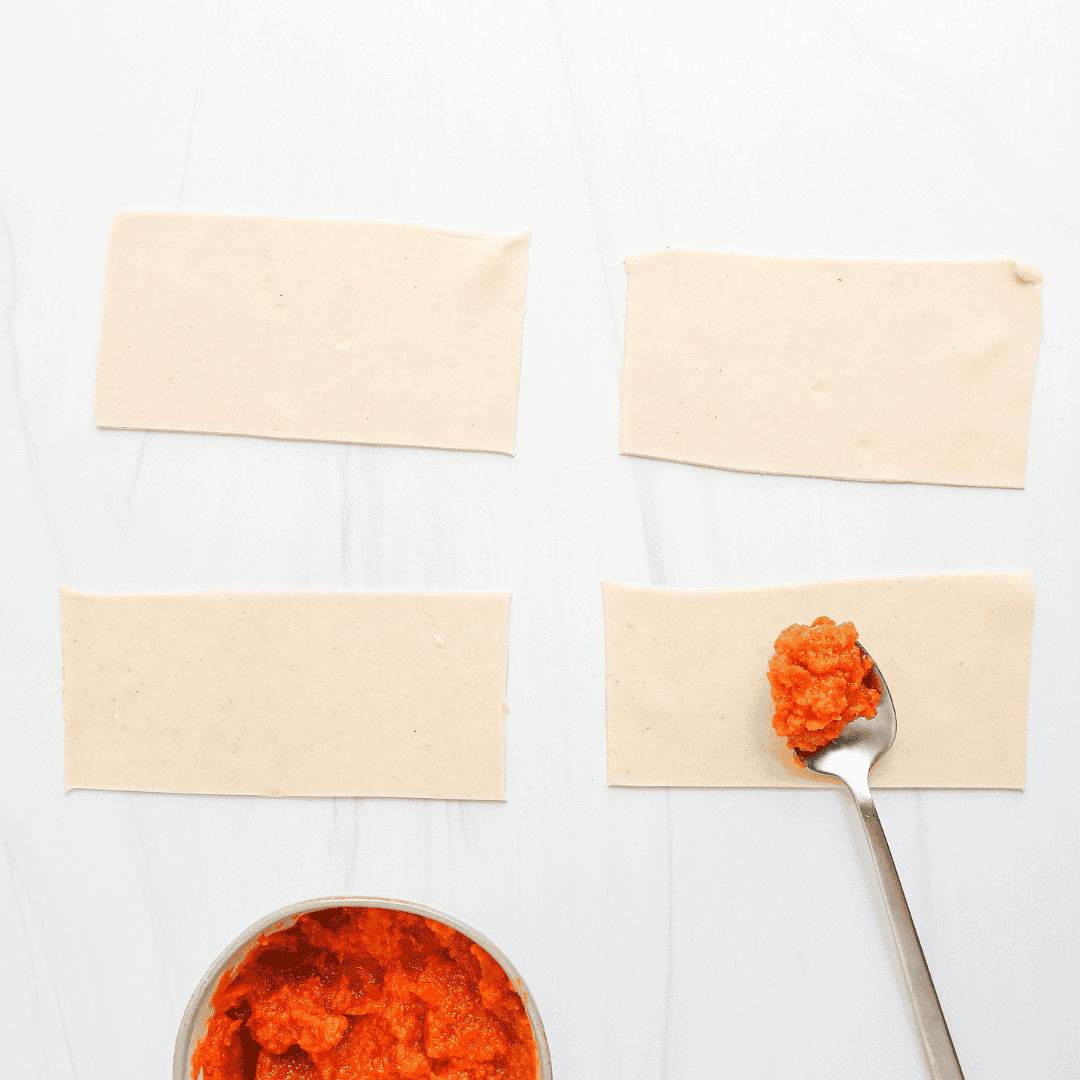 "Assembling Air Fryer Pumpkin Pop-Tarts before cooking"
