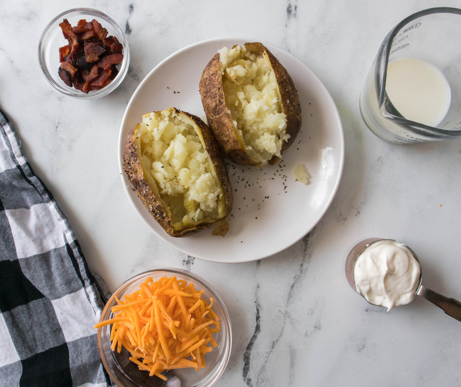 Ingredients Needed For Air Fryer Twice Baked Potatoes on a white background.