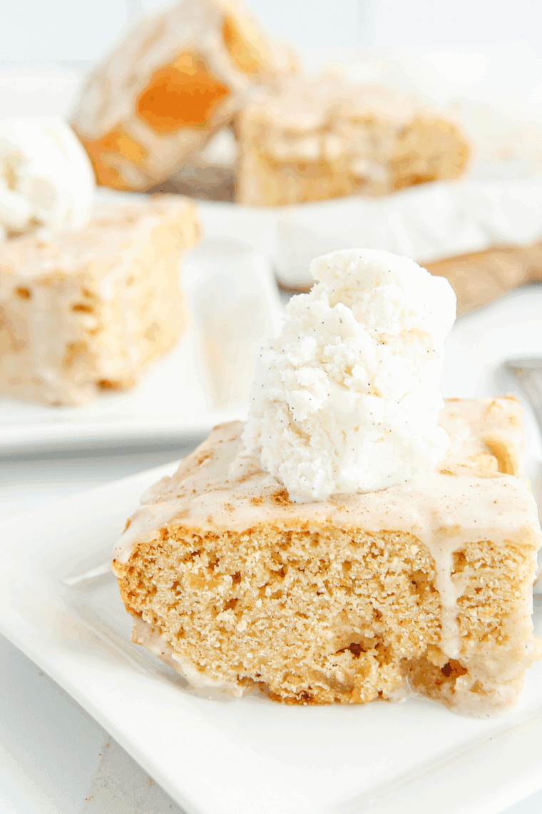 Homemade Applebee’s Butter Pecan Blondie with ice cream and rich pecan sauce on top.