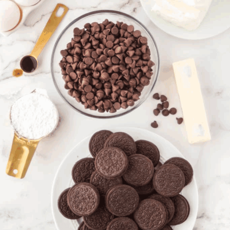 Copycat Cheesecake Factory Godiva Chocolate Cheesecake Ingredients on kitchen table.