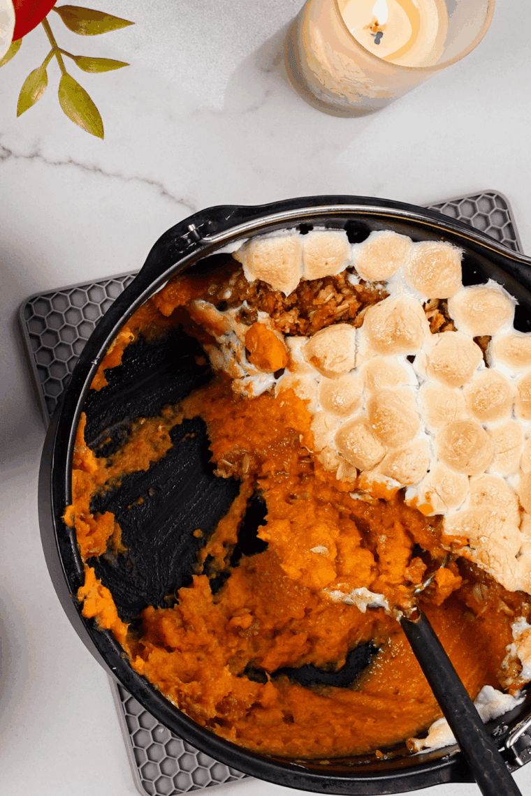Close-up of melty marshmallow-topped sweet potato casserole fresh from the oven