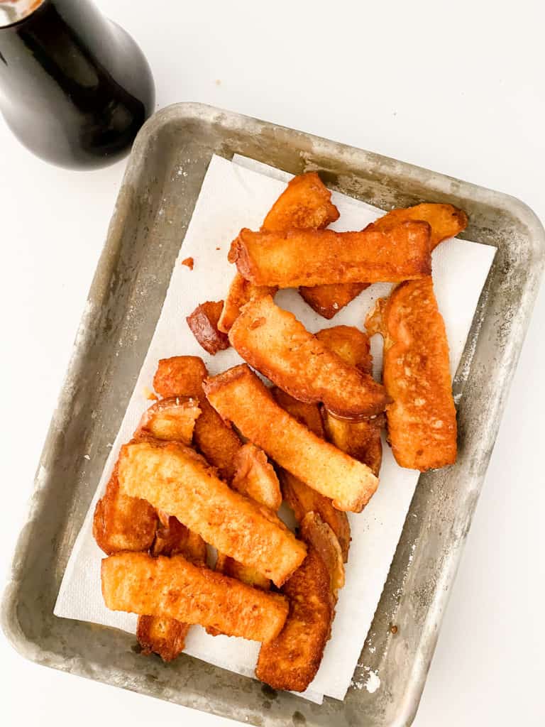 "Copycat Burger King French toast sticks arranged on a plate, ready to be enjoyed."