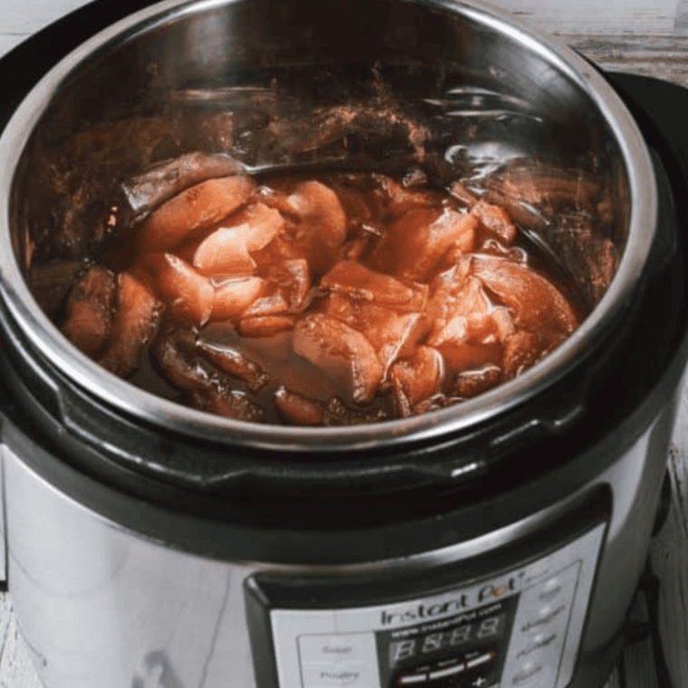 Cook the Mixture: Seal the lid of your pressure cooker and set it to cook on high pressure for about 20 minutes. This timing can vary slightly depending on the specific type and brand of pressure cooker you are using. Natural Release: After the cooking time has elapsed, allow the pressure to release naturally. This will prevent the apples from becoming too mushy and help maintain a deeper flavor.