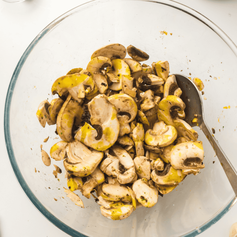Add sliced mushrooms to butter mixture and toss to coat.