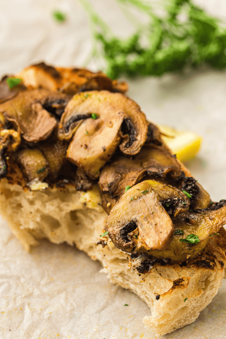 "Texas Roadhouse-style sautéed mushrooms served in a bowl."