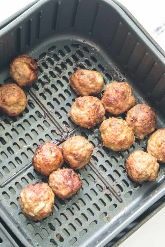 Place frozen Ikea meatballs in the air fryer basket in a single layer.