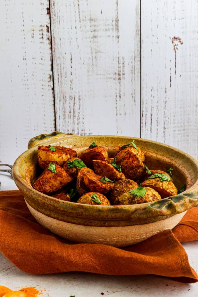 Air Fryer Bombay Potatoes seasoned with Indian spices, crispy and golden brown