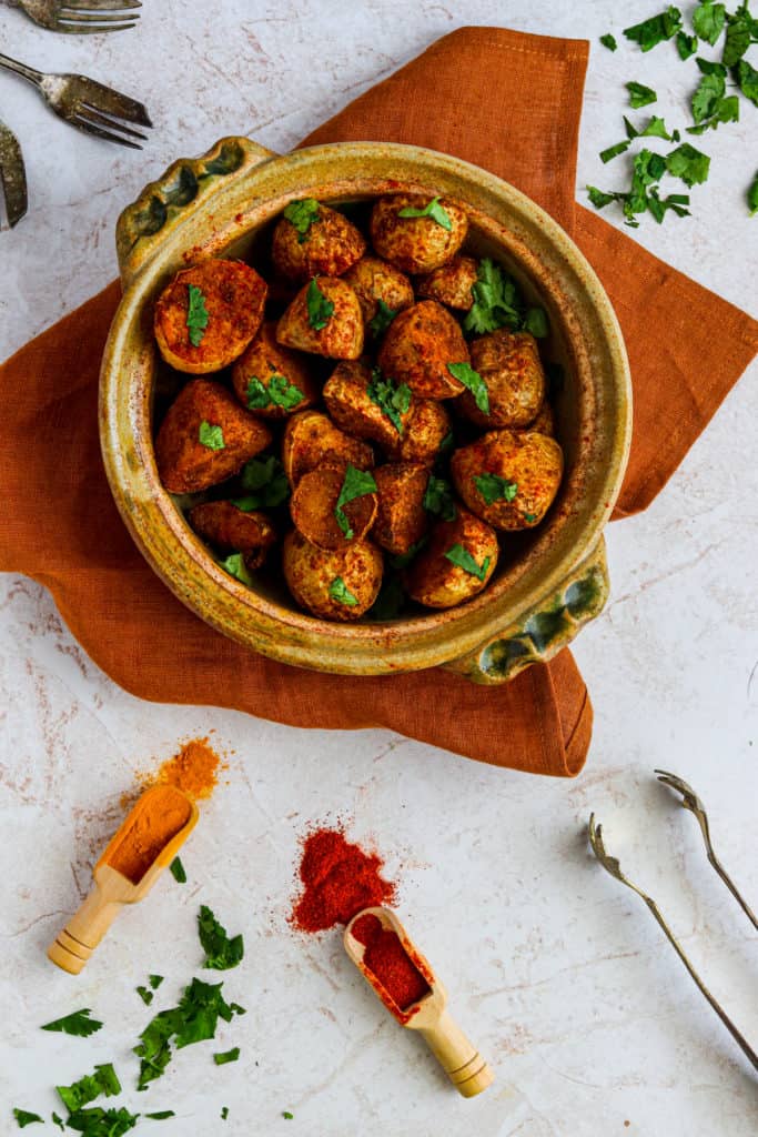 Air Fryer Bombay Potatoes seasoned with Indian spices, crispy and golden brown