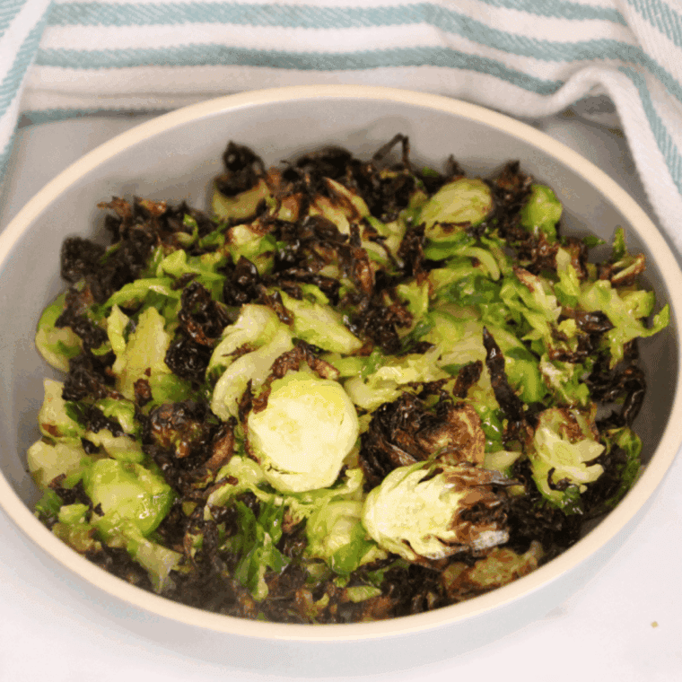 Crispy shaved Brussels sprouts in air fryer, golden and seasoned