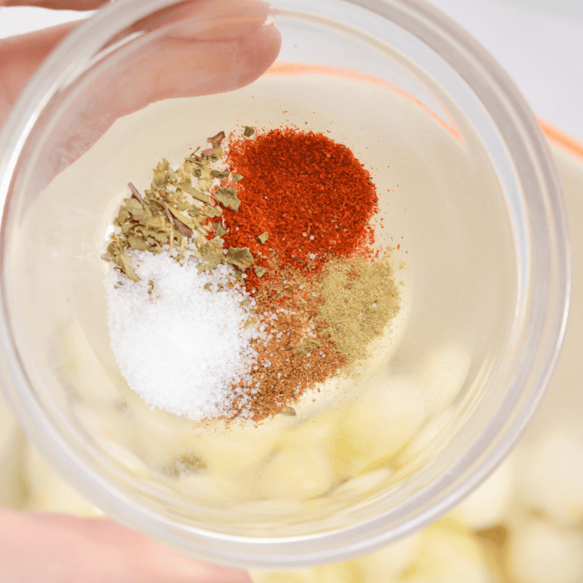 Mix the frozen pearl onions with seasonings.