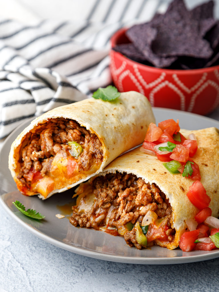 "Crispy air fryer meximelt filled with melted cheese and beef"
