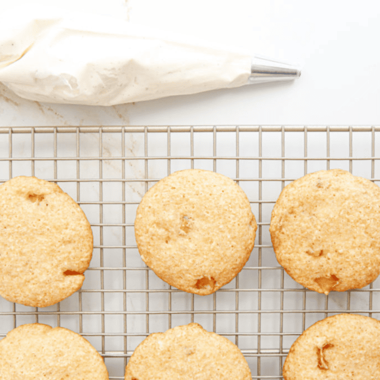 Apple Cinnamon Whoopie Pies cooling on wire rack.