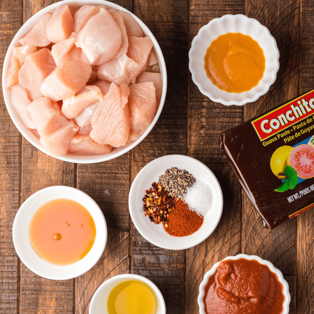 Ingredients for air fryer buffalo chicken bites: chicken, flour, eggs, buffalo sauce and spices