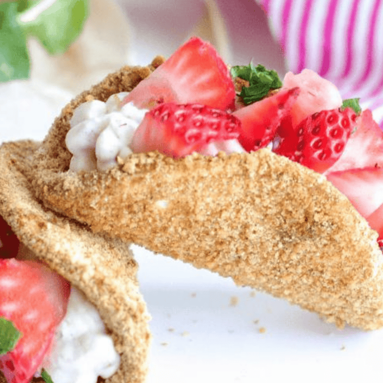 Easy air fryer cheesecake strawberry tacos — crispy graham shells with strawberry cheesecake filling