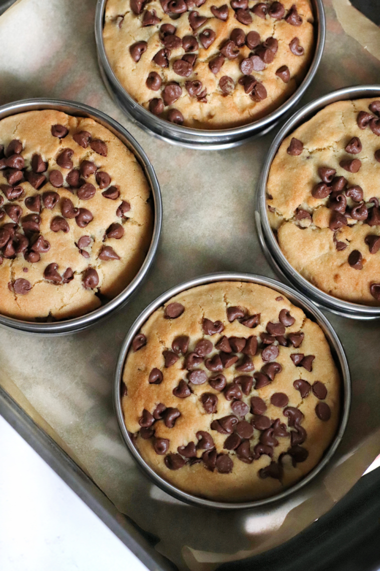 Indulge in a plate of delicious Chick-fil-A-inspired cookies, featuring soft, chewy centers loaded with chocolate chips and baked to perfection.
