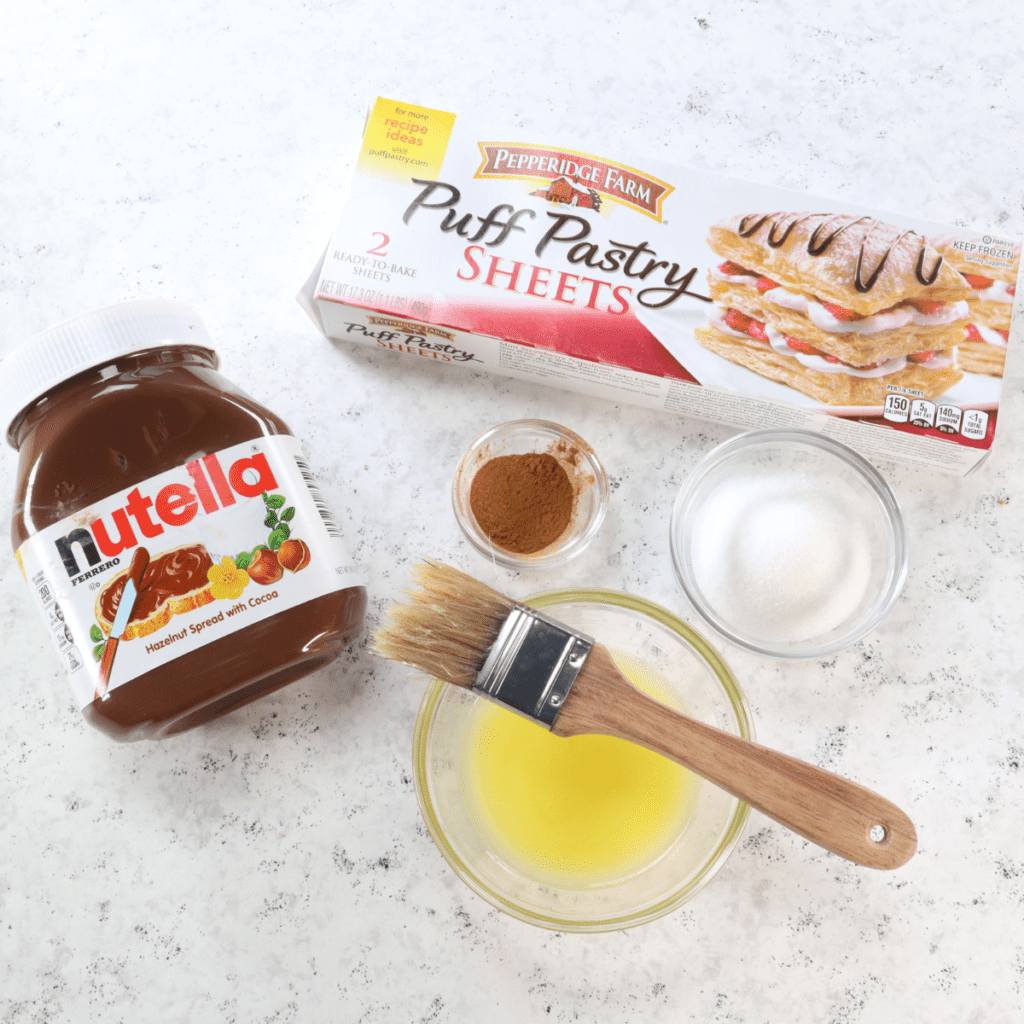 Ingredients Needed For Air Fryer Nutella Stuffed Churros on kitchen table.