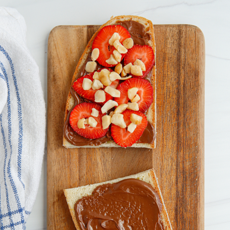 Fresh sliced strawberries layered over Nutella-coated bread for an air fryer panini