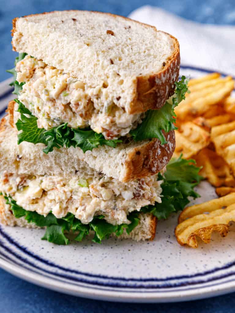 Colorful Air Fryer Chick-Fil-A Chicken Salad served on a plate, featuring a variety of vegetables and dressing.
