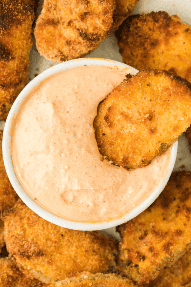Crispy copycat Hooters fried pickles with golden breading served with dipping sauce