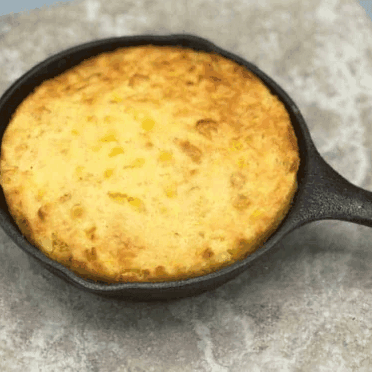 Homemade Golden Corral cornbread served warm and golden brown with a soft, fluffy texture.