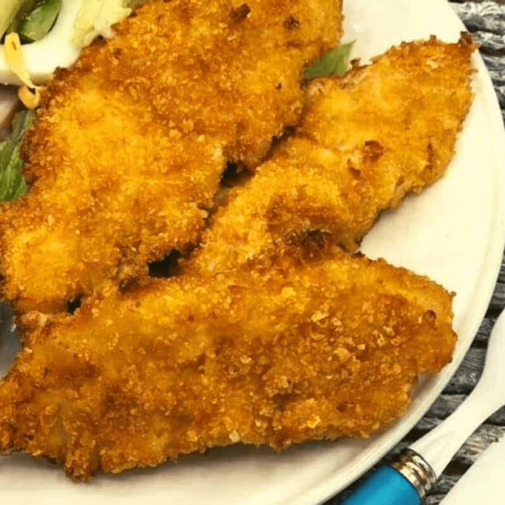 Crispy Air Fryer Cornflake Chicken Tenders with a golden, crunchy cornflake coating, making for a delicious and easy dinner option.