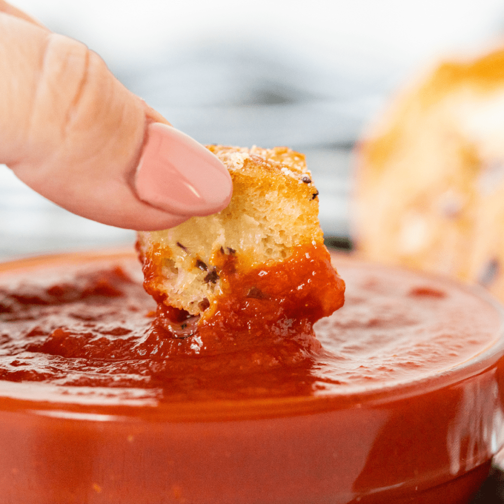 Golden, cheesy air fryer crack bread, sliced and ready to serve as a delicious snack or appetizer.
