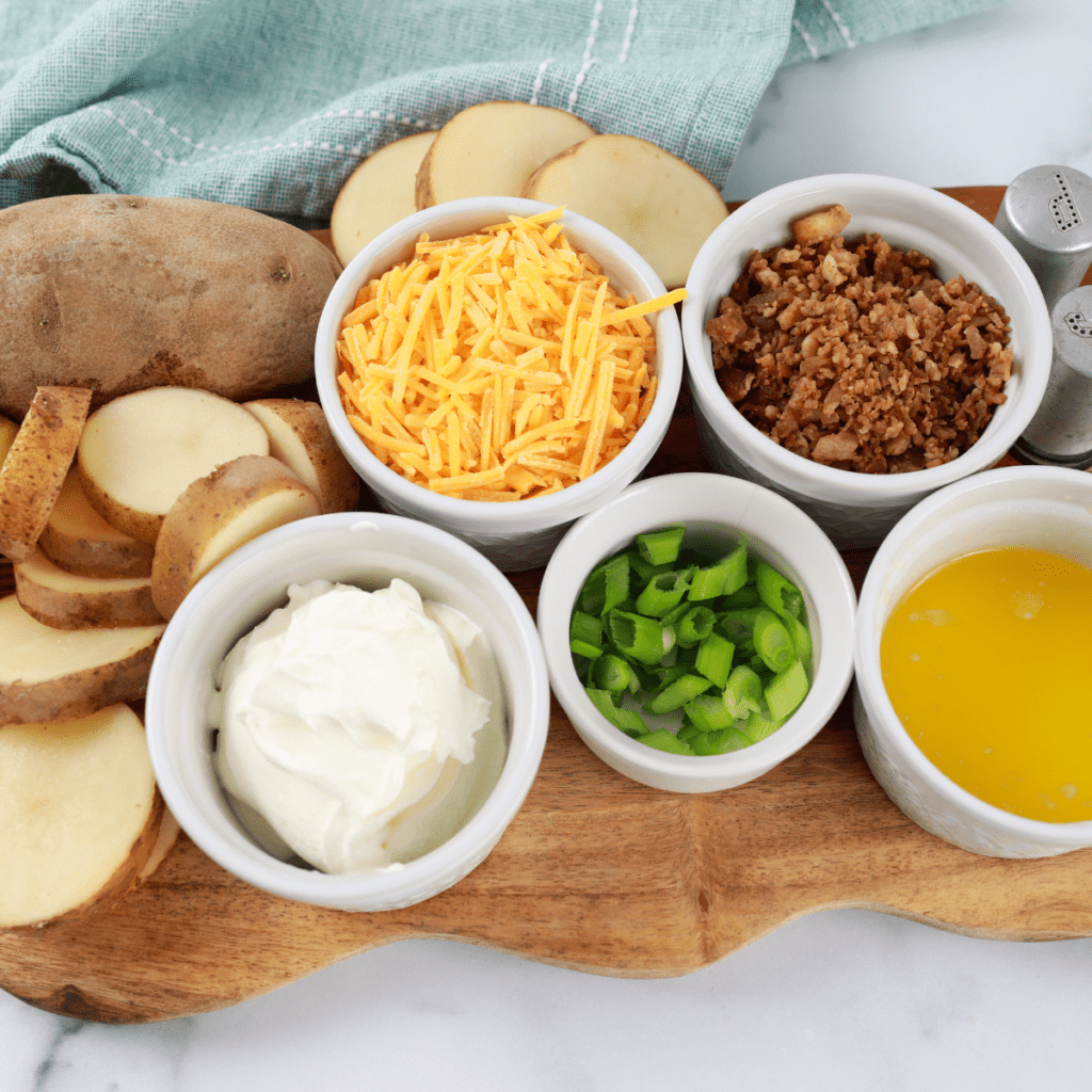Ingredients Needed For Air Fryer Loaded Potato Slices on a table.