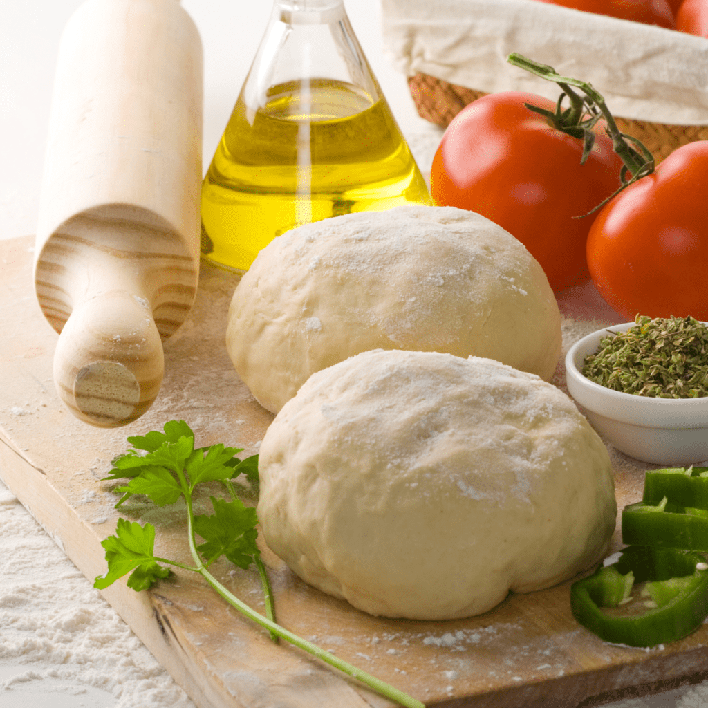 Ingredients Needed For Air Fryer Spinach and Feta Stromboli on kitchen table.