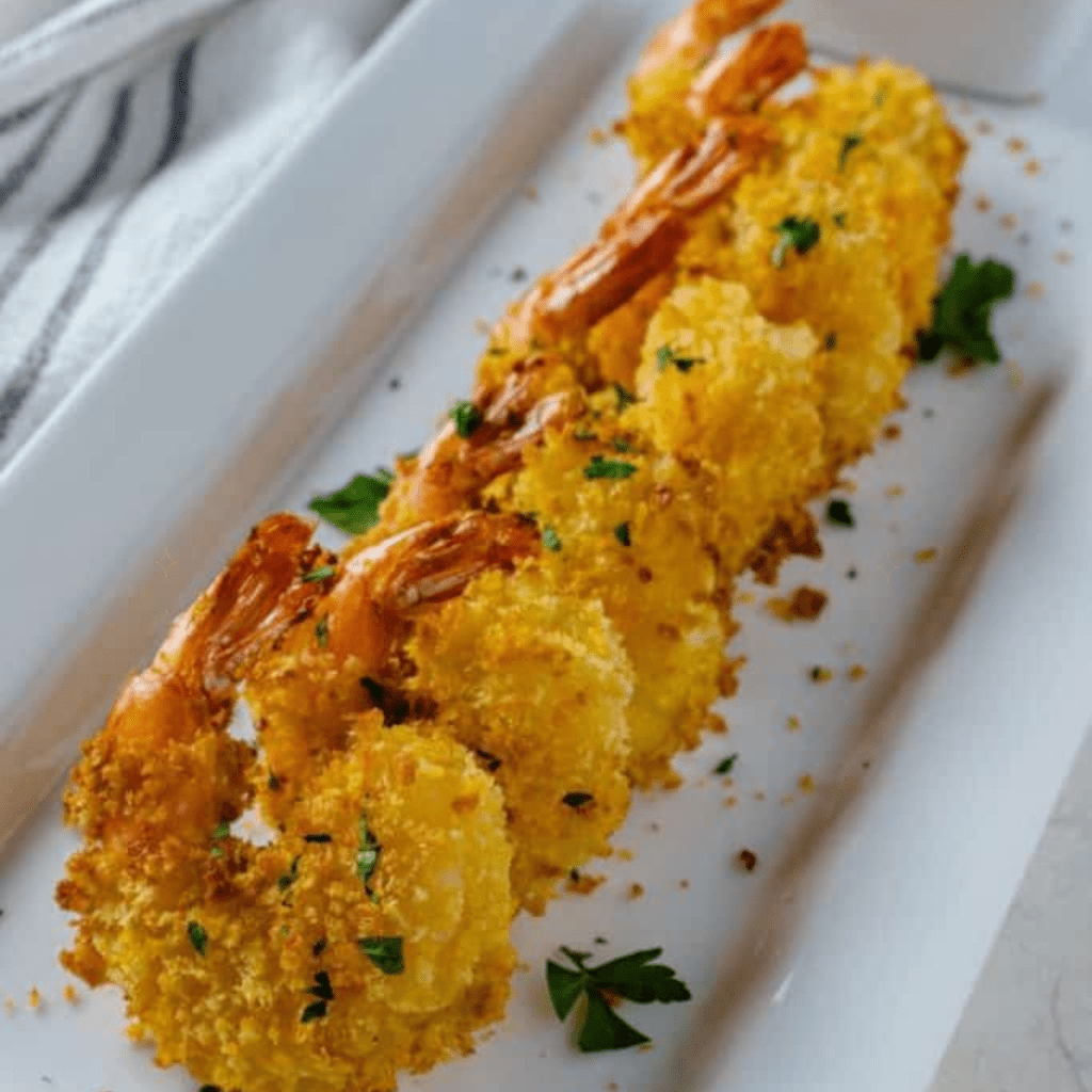 Who doesn't love Air Fryer Bang Bang Shrimp? This is a popular item and the best air fryer copycat recipe from Bonefish Grill; it is perfectly cooked breaded shrimp, with a signature sweet chili sauce, over the top; it's amazing!



Served as a main dish or a great appetizer, this recipe will aim to please, and it might be one of the best things you cook in your air fryer. 