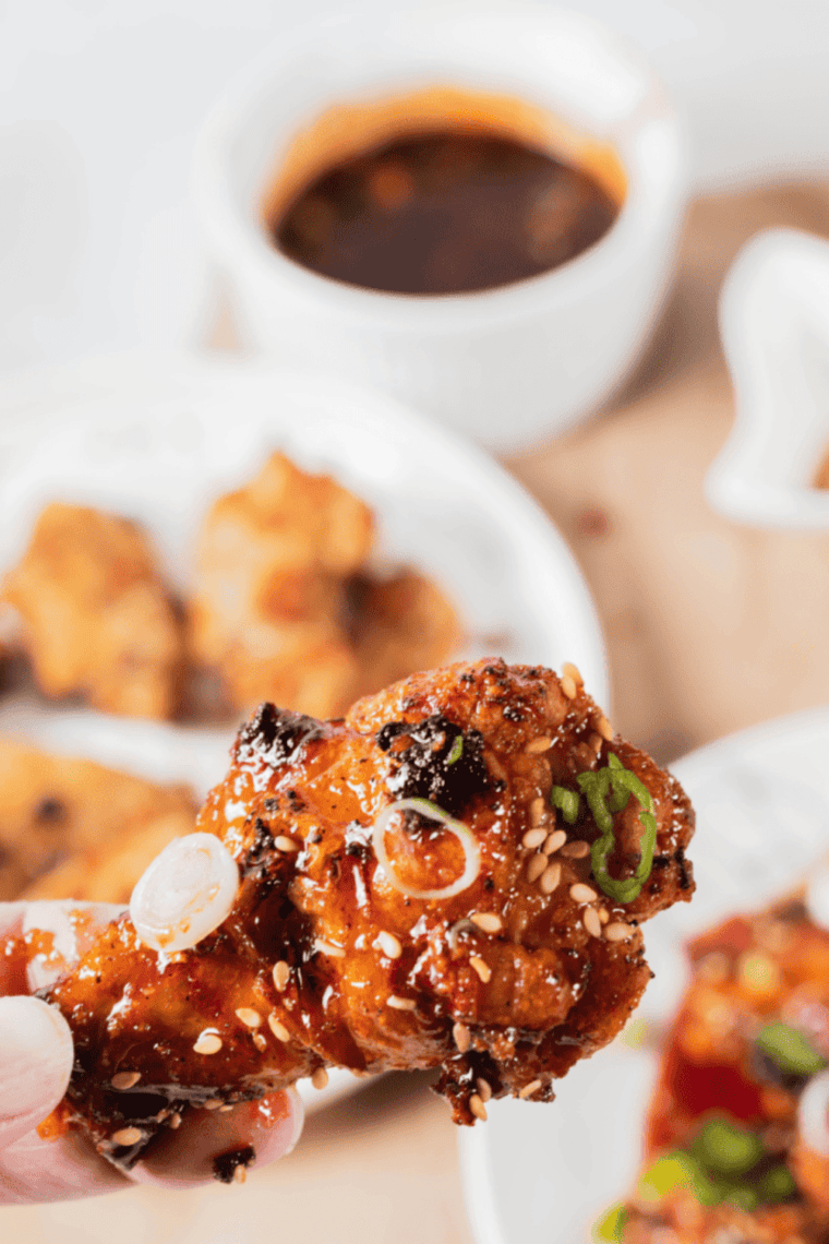 Plate of spicy chicken wings served with ranch dressing