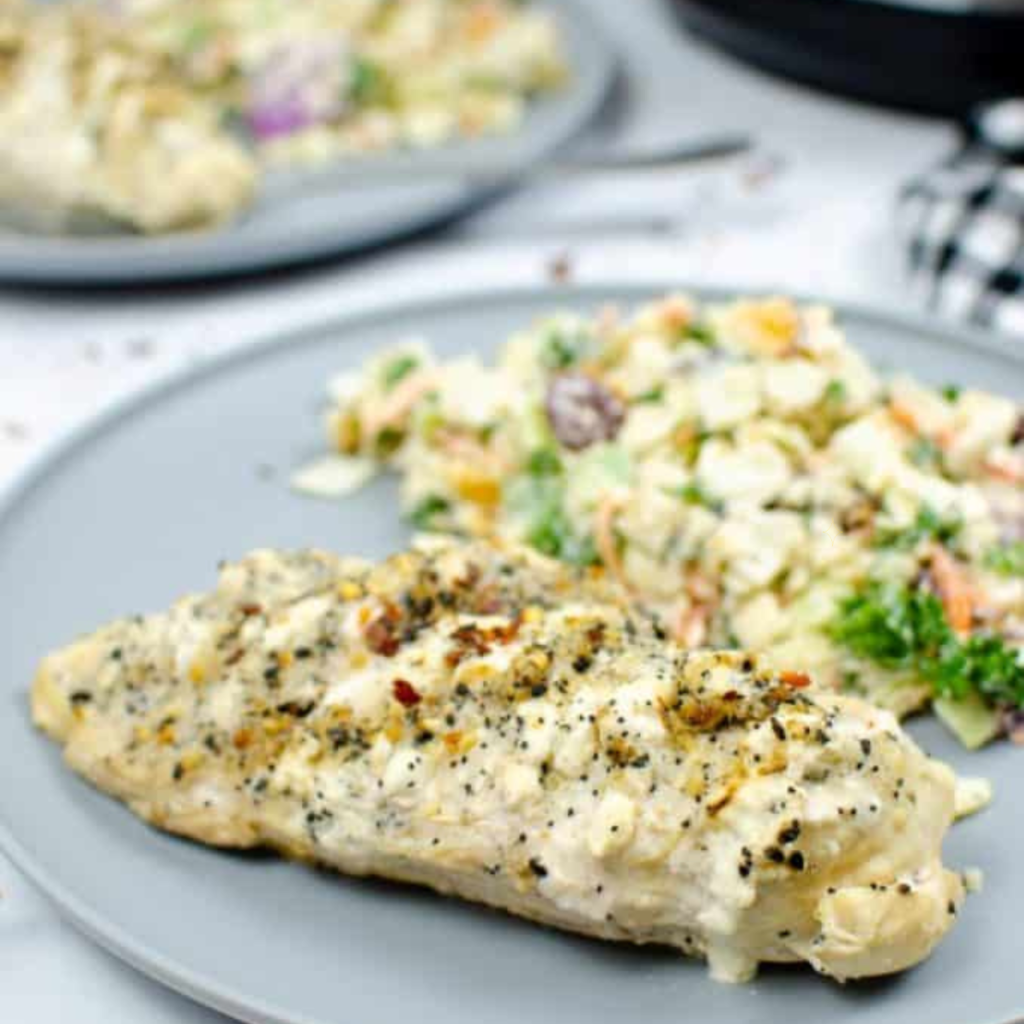 Tender Instant Pot Cream Cheese Chicken served with a creamy, rich sauce.