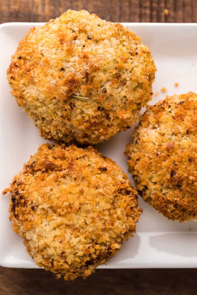Delicious Air Fryer Chicken Croquettes arranged on a serving platter with dipping sauce."