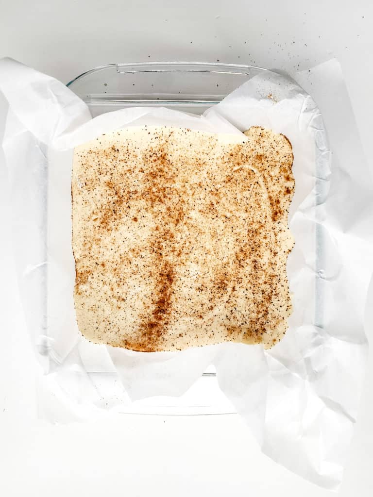 "Instant Pot set to cooking mode with the eggnog fudge mixture inside, showcasing the setup."