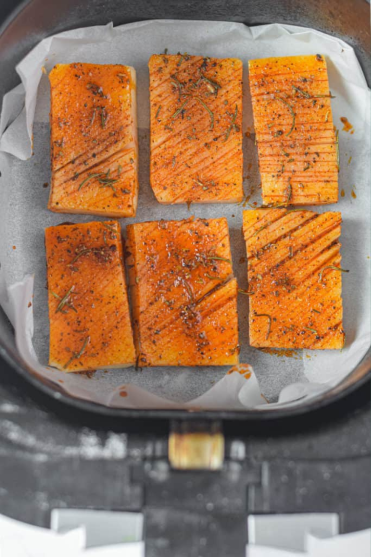 "Close-up of perfectly cooked accordion potatoes with crispy edges and soft centers."