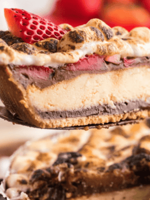 “Air Fryer Berry S’mores Cheesecake with graham cracker crust, fresh berries, and toasted marshmallows on top.”