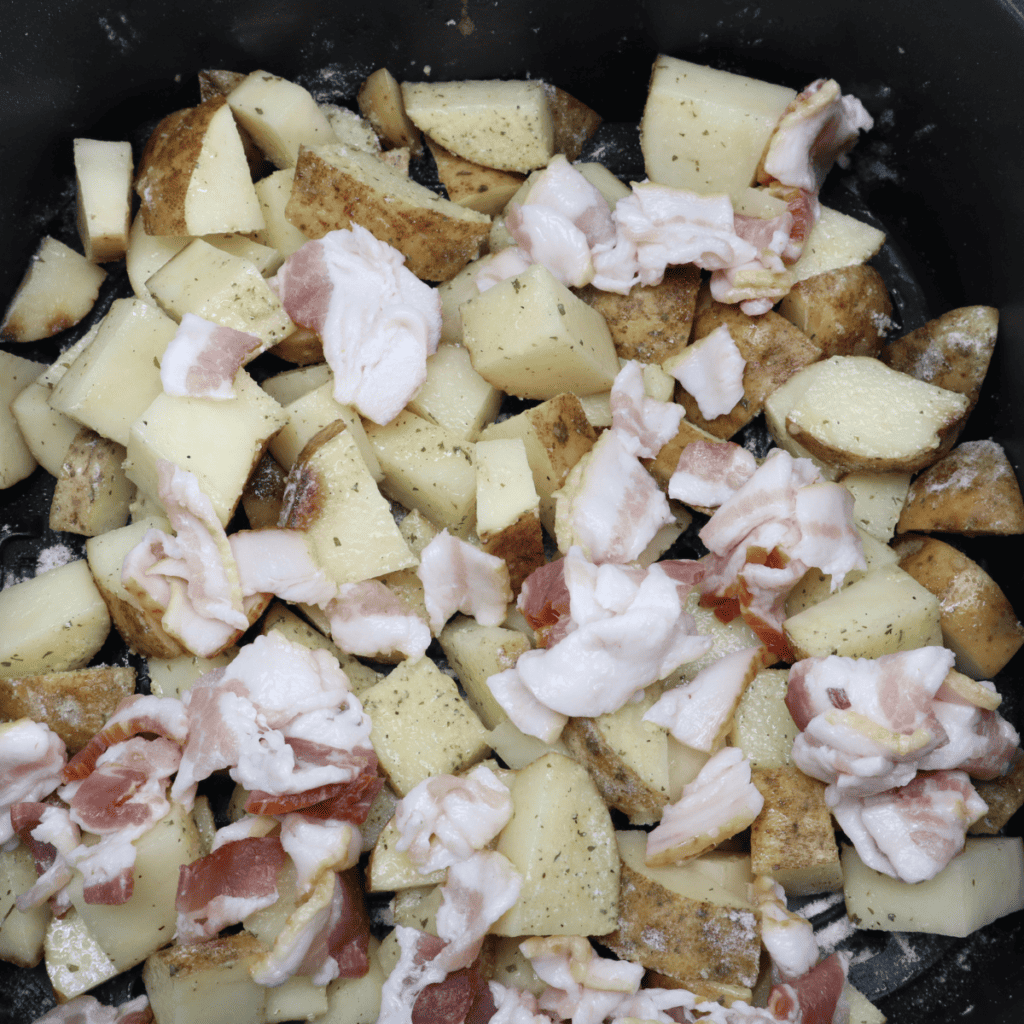 Cooking potatoes and bacon in the air fryer at 350°F, then topping with shredded cheese to melt using the residual heat