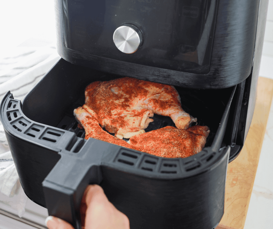 air fryer chicken quarters in air fryer basket