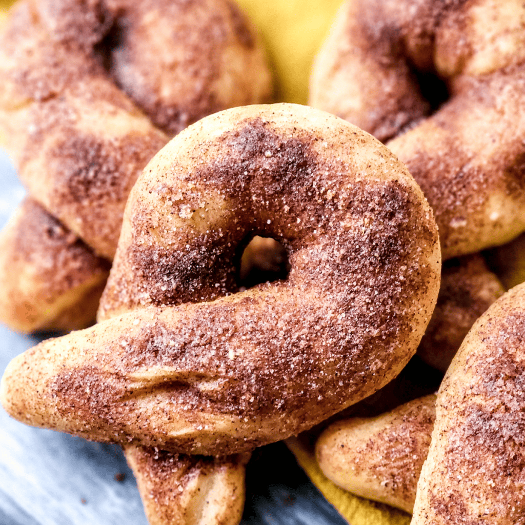 Golden and crispy Air Fryer Copycat Domino’s Cinnamon Bread Twists served on a plate, dusted with cinnamon sugar.
