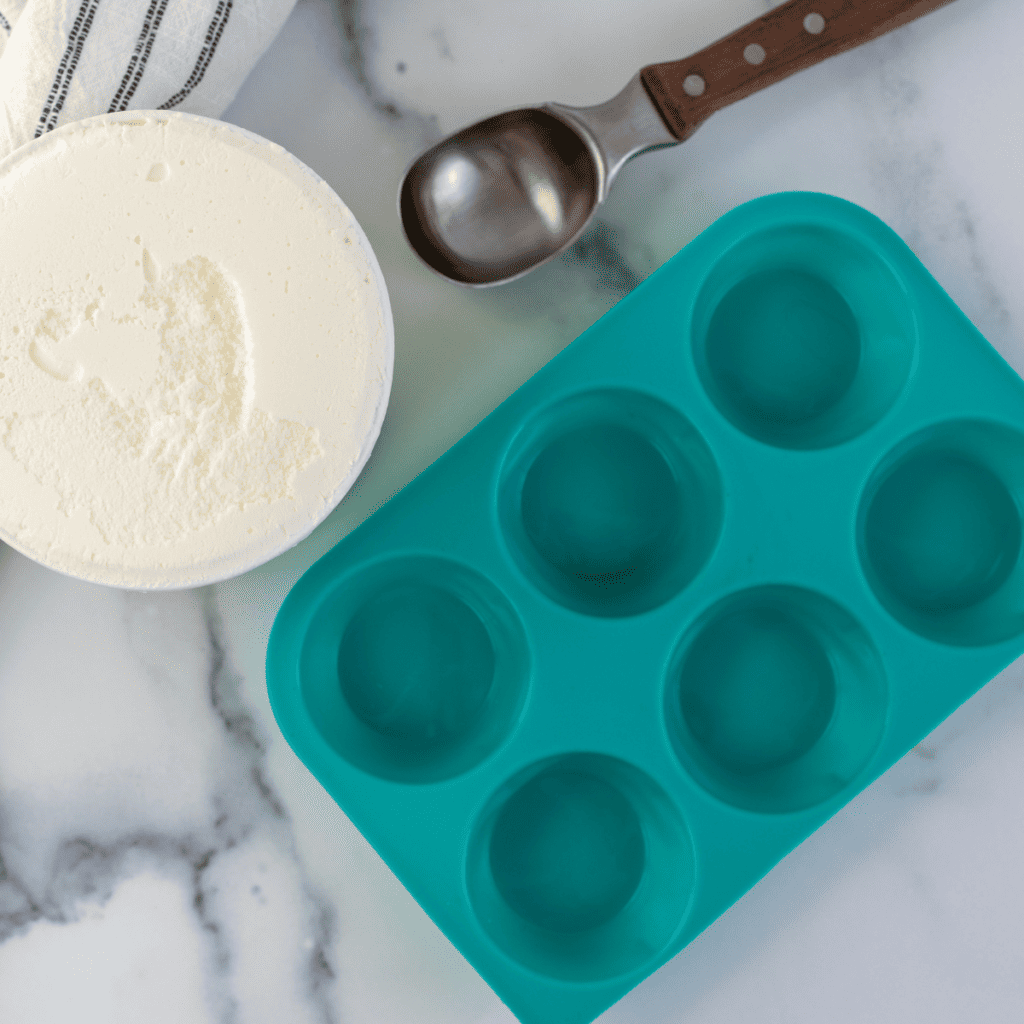 Step-by-step process of coating ice cream balls with crushed cornflakes.