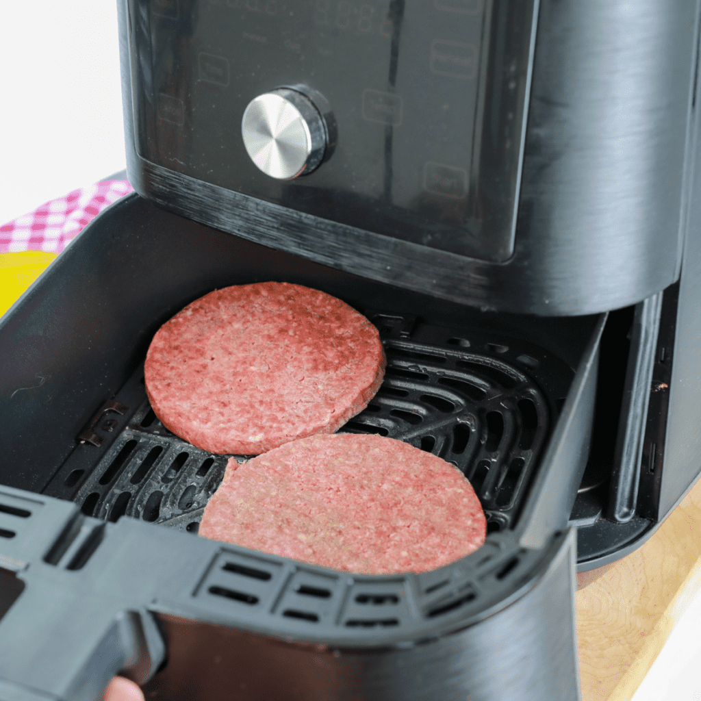 Remember the step-by-step directions, full recipe, and detailed ingredient list are below, in the printable recipe card at the bottom of the post, as well as the nutritional information.

Frozen Veggie Burgers (1-2 patties): Choose your favorite frozen veggie burgers, which come packed with a blend of vegetables, grains, and seasonings, offering a nutritious and tasty meat alternative.

Hamburger Buns (1-2 buns): Select soft and fresh burger buns to complement your veggie burger; whole wheat or gluten-free options are also great for those with dietary preferences.

Lettuce (1-2 leaves): A leaf or two of crisp lettuce adds a fresh crunch to your burger and a boost of green, leafy nutrients.

Tomato (1, sliced): Fresh tomato slices contribute a juicy and slightly tangy flavor, complementing the savory taste of the veggie patty.

Onion (1, sliced): Thin slices of onion, whether red onion, white, or yellow, provide a sharp, slightly sweet flavor and a satisfying crunch.

Cheese (1-2 slices, optional): Add a slice of your favorite cheese, like cheddar or Swiss, for a creamy, melty texture and rich flavor.

Condiments (ketchup, mustard, mayo, etc.): Personalize your veggie burger with your choice of ketchup, mustard, or mayonnaise to enhance flavor.

Pickles (optional): A few slices can add a vinegary crunch and a hint of acidity, balancing out the flavors in your burger.

Avocado (optional): For a creamy addition, include a few slices of ripe avocado, which will add a buttery texture and a dose of healthy fat