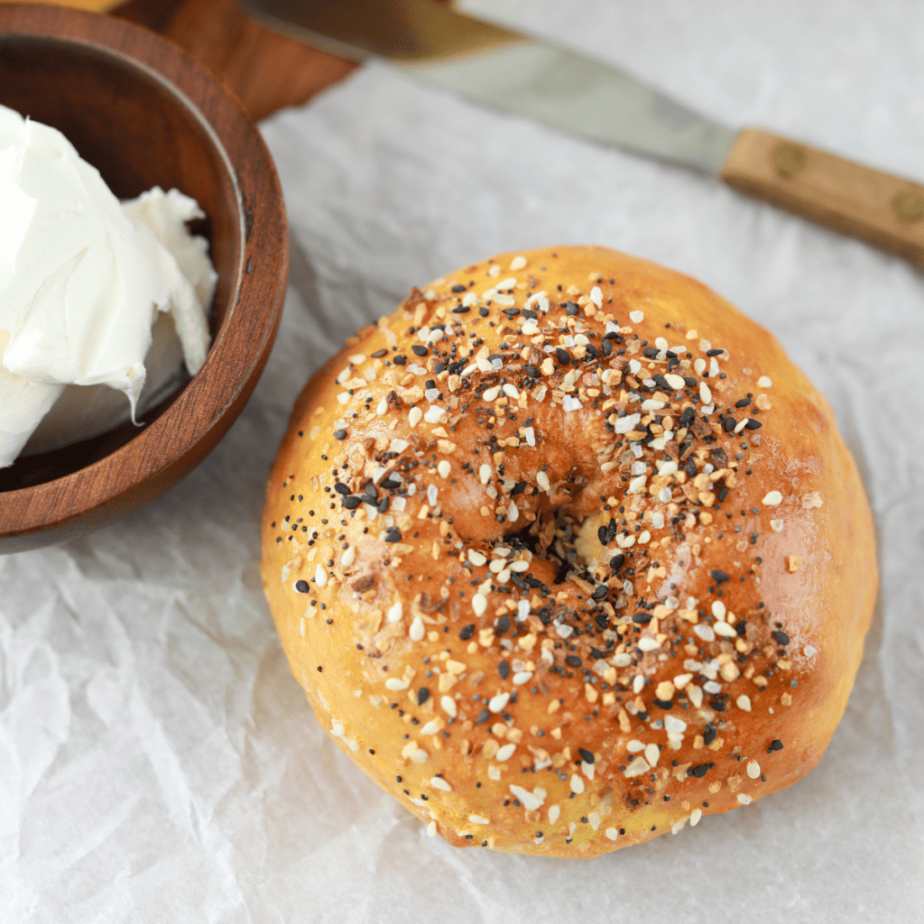 Freshly air-fried gluten-free bagels showcasing a crispy exterior and tender inside