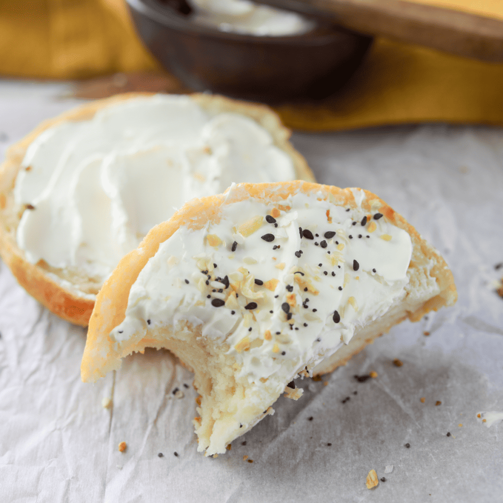 Plate of gluten-free bagels made in the air fryer, highlighting their perfect texture and color