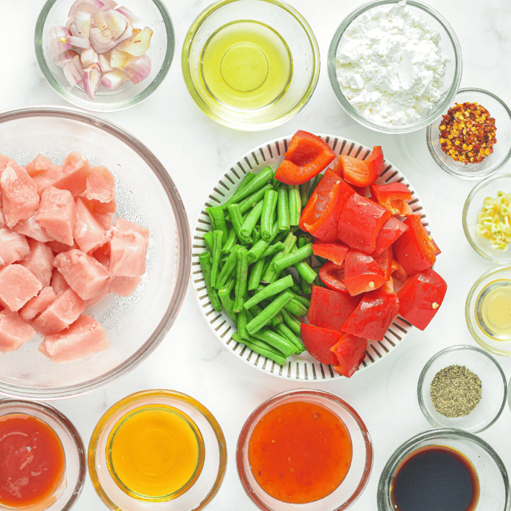 Ingredients Needed For Air Fryer Honey Garlic Chicken on white table.