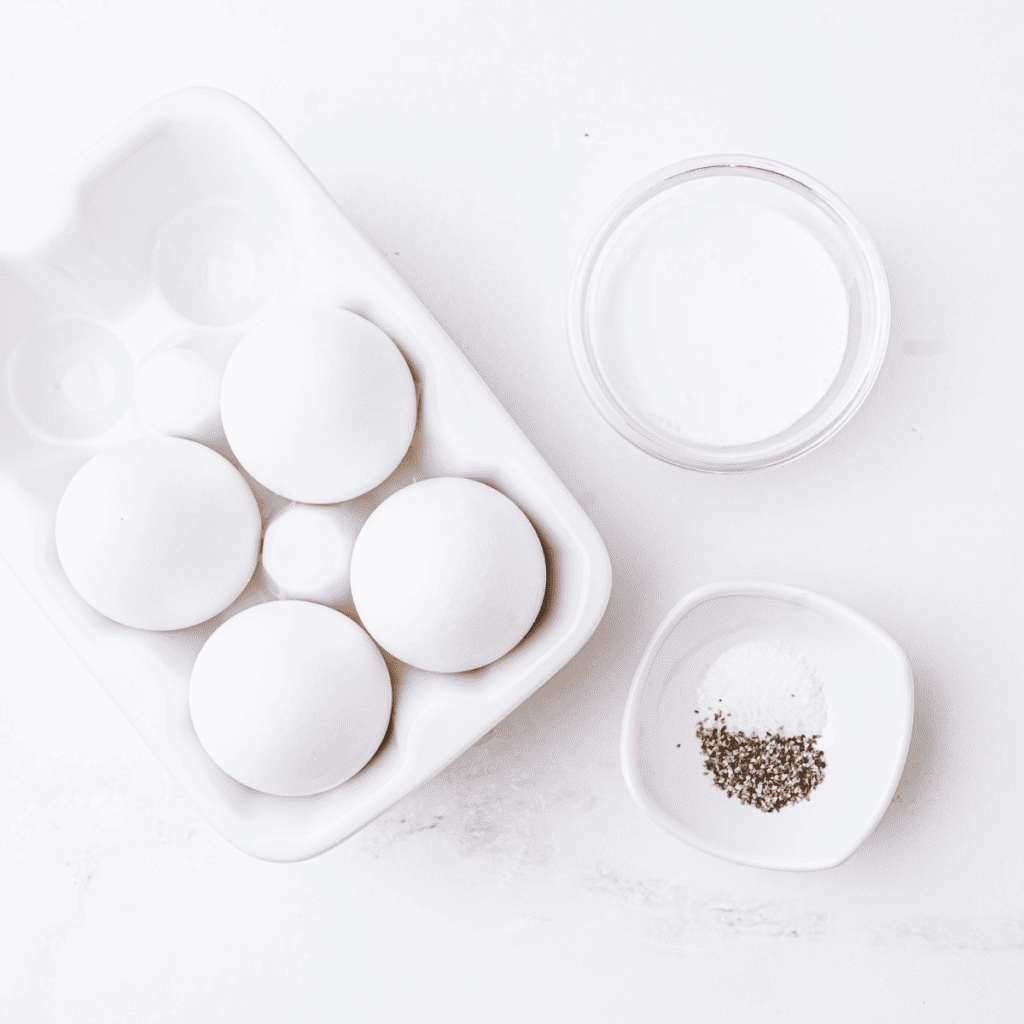 Ingredients needed for Air Fryer IHOP Cheeseburger Omelette on kitchen table.